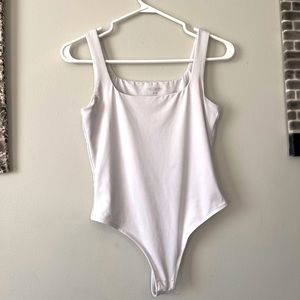 White shape-wear body suit.